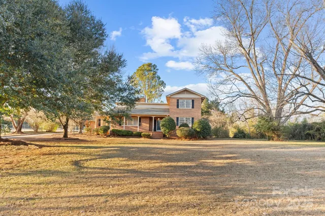a view of a patio with a yard
