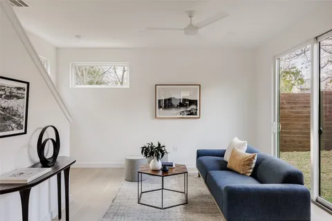 a living room with furniture and window