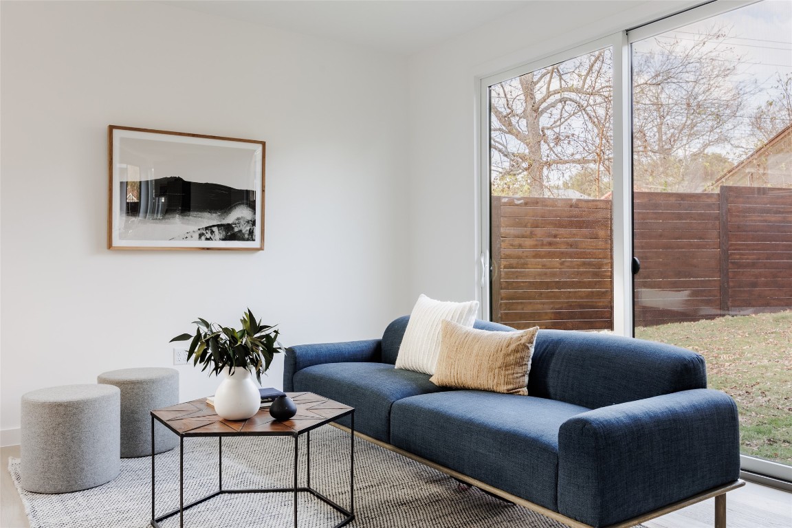 3209 Dolphin Drive, Unit 2 Austin, TX 78704 - Photo 12 of 40 a living room with furniture and a large window