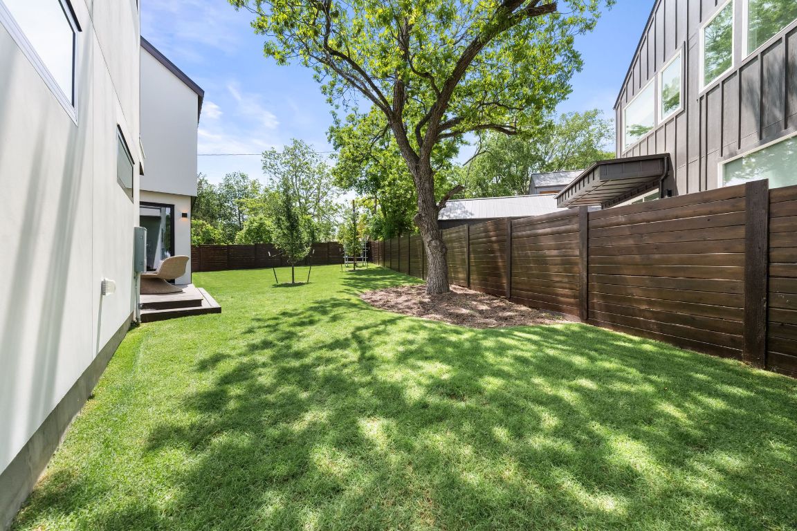 3209 Dolphin Drive, Unit 2 Austin, TX 78704 - Photo 15 of 40 a view of a backyard with stairs