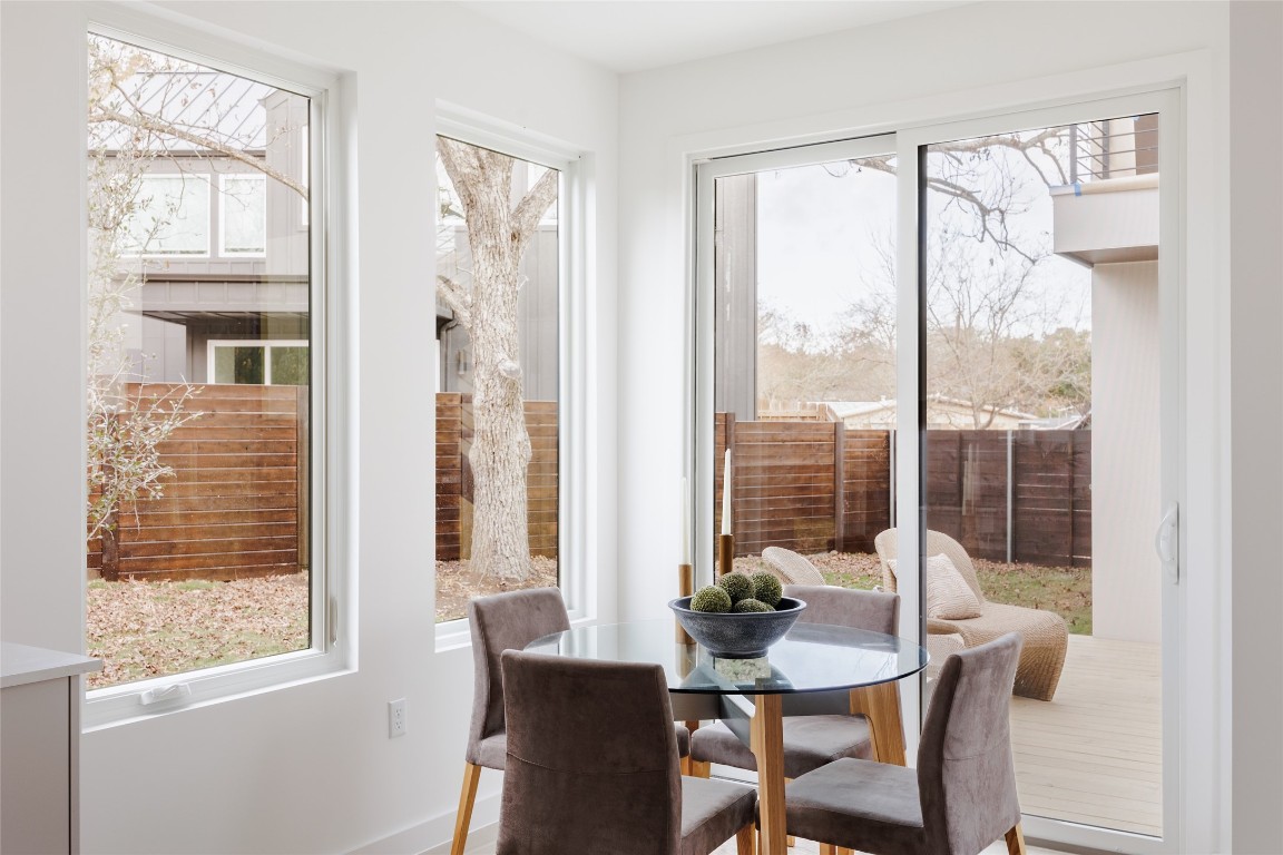 3209 Dolphin Drive, Unit 2 Austin, TX 78704 - Photo 16 of 40 a view of a dining room with furniture window and outside view