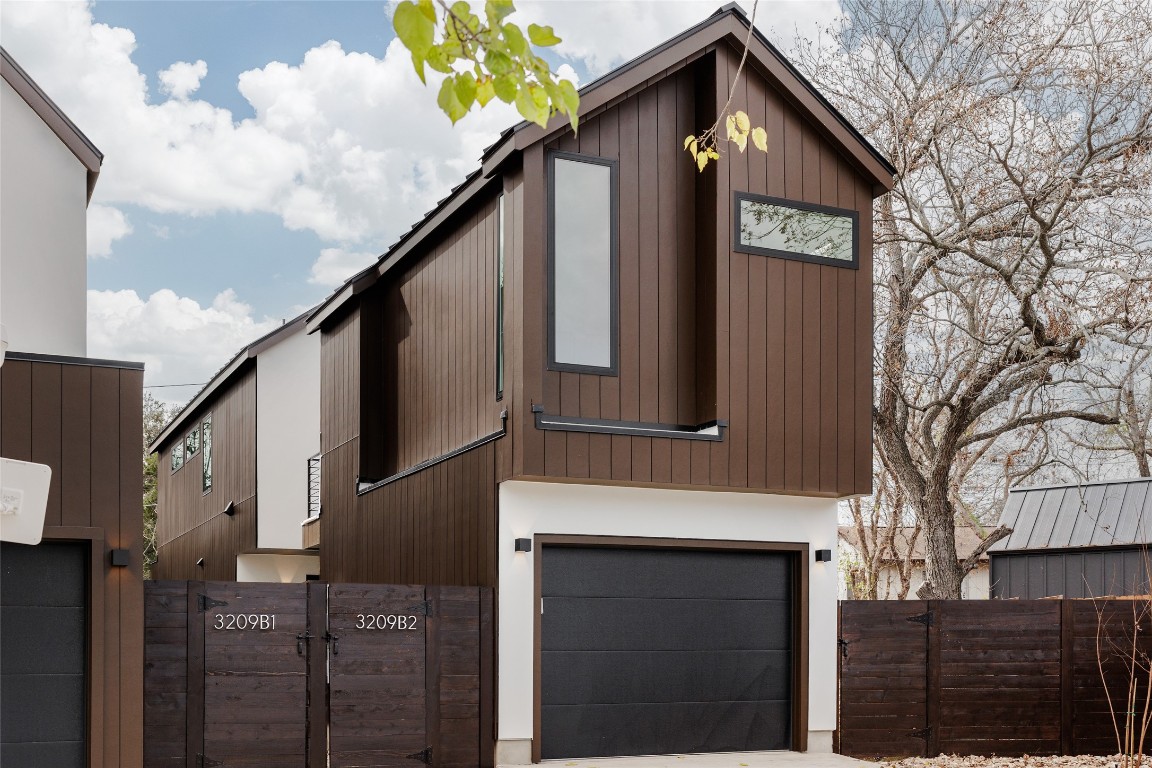 3209 Dolphin Drive, Unit 2 Austin, TX 78704 - Photo 2 of 40 a front view of a house with garden