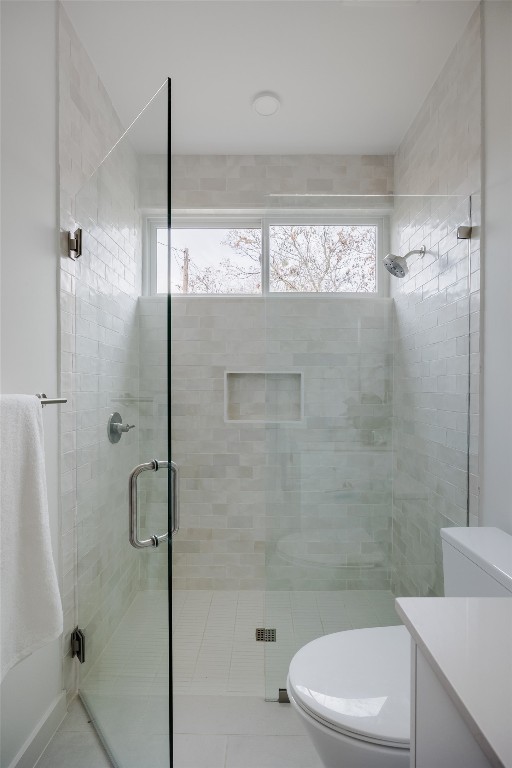 3209 Dolphin Drive, Unit 2 Austin, TX 78704 - Photo 23 of 40 a bathroom with a shower a toilet and sink