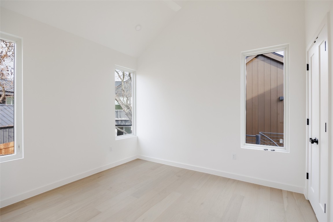 3209 Dolphin Drive, Unit 2 Austin, TX 78704 - Photo 24 of 40 an empty room with windows