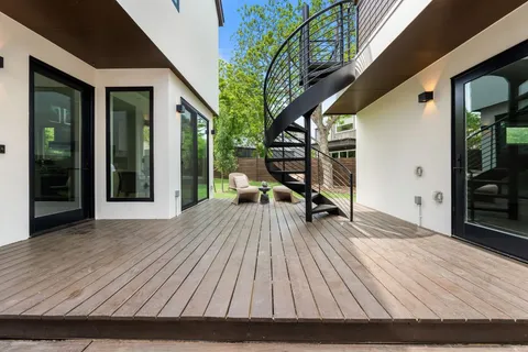 a table with a vase and a window