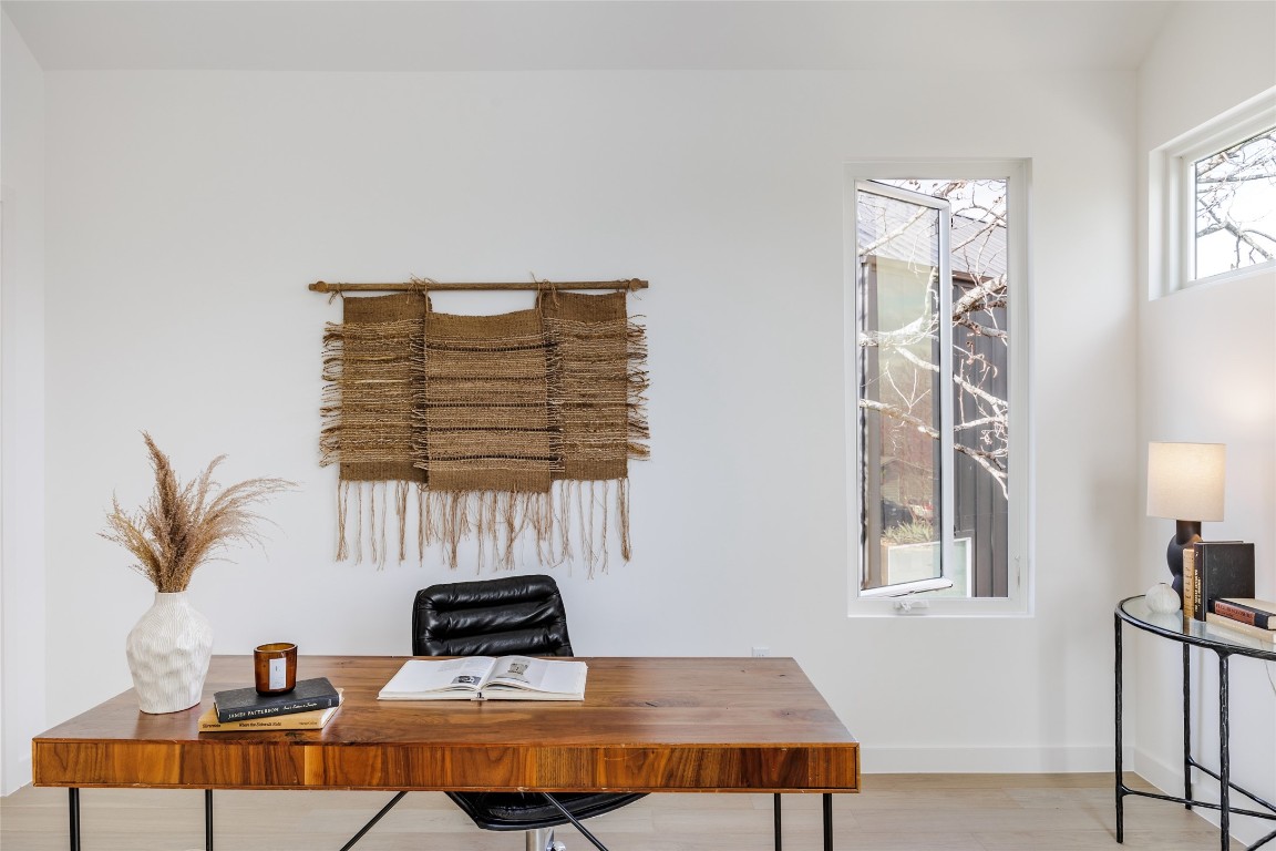 3209 Dolphin Drive, Unit 2 Austin, TX 78704 - Photo 32 of 40 a table with a vase and a window