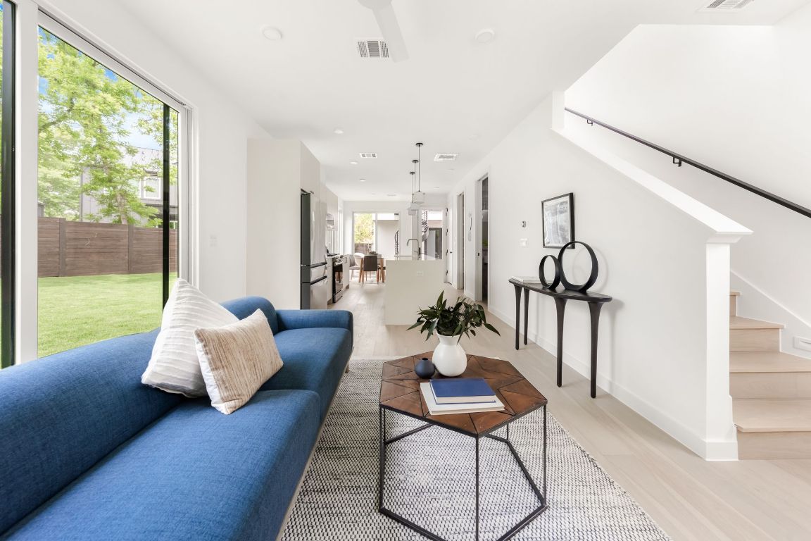 3209 Dolphin Drive, Unit 2 Austin, TX 78704 - Photo 10 of 40 a living room with furniture and wooden floor