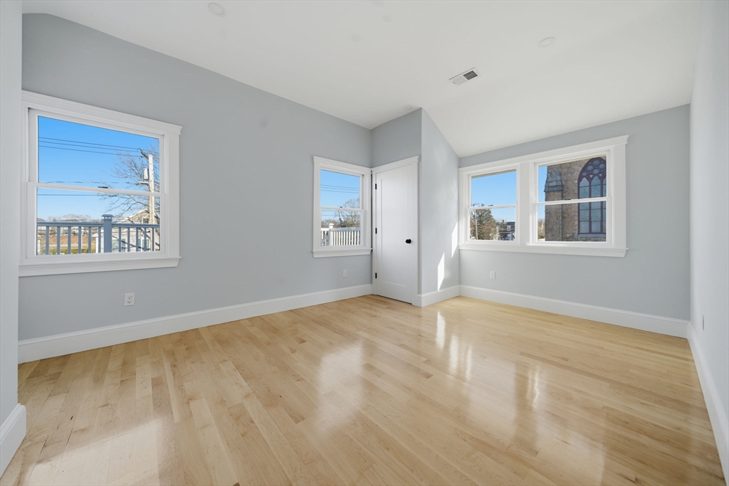 400 Adams Street, Unit A Milton, MA 02186 - Photo 26 of 27 a view of an empty room with a window