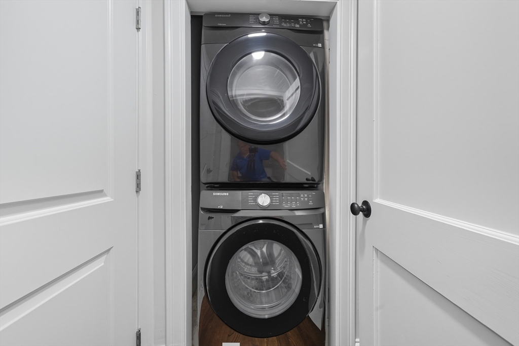 400 Adams Street, Unit A Milton, MA 02186 - Photo 7 of 27 a utility room with dryer and washer