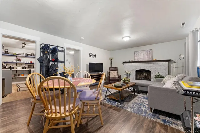 a kitchen with stainless steel appliances a sink stove and cabinets