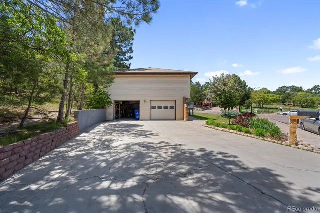 an aerial view of residential house with outdoor space