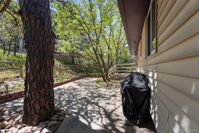an aerial view of a house with a garden