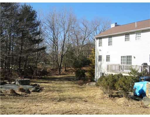 1366 Snake Hill Road Glocester, RI 02857 - Photo 3 of 8 Exterior Back. Enjoy your private deck overlooking backyard, or multilple patio areas. Great for entertaining.