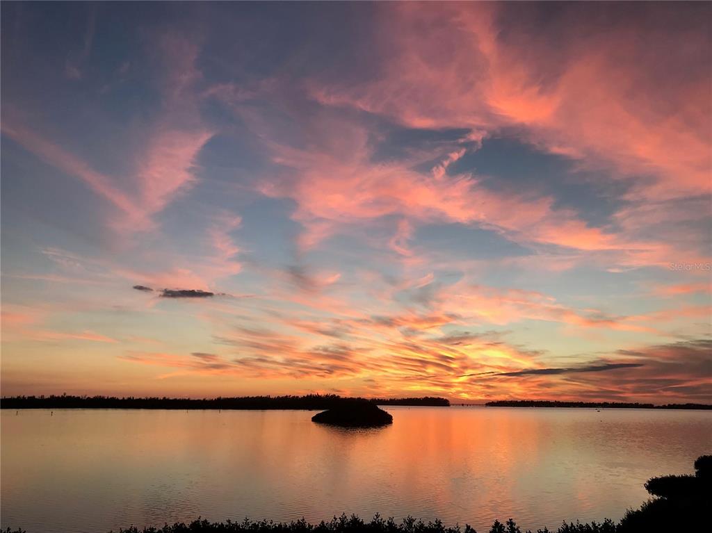 4765 Independence Drive Bradenton, FL 34210 - Photo 2 of 39 a view of sunset and lake