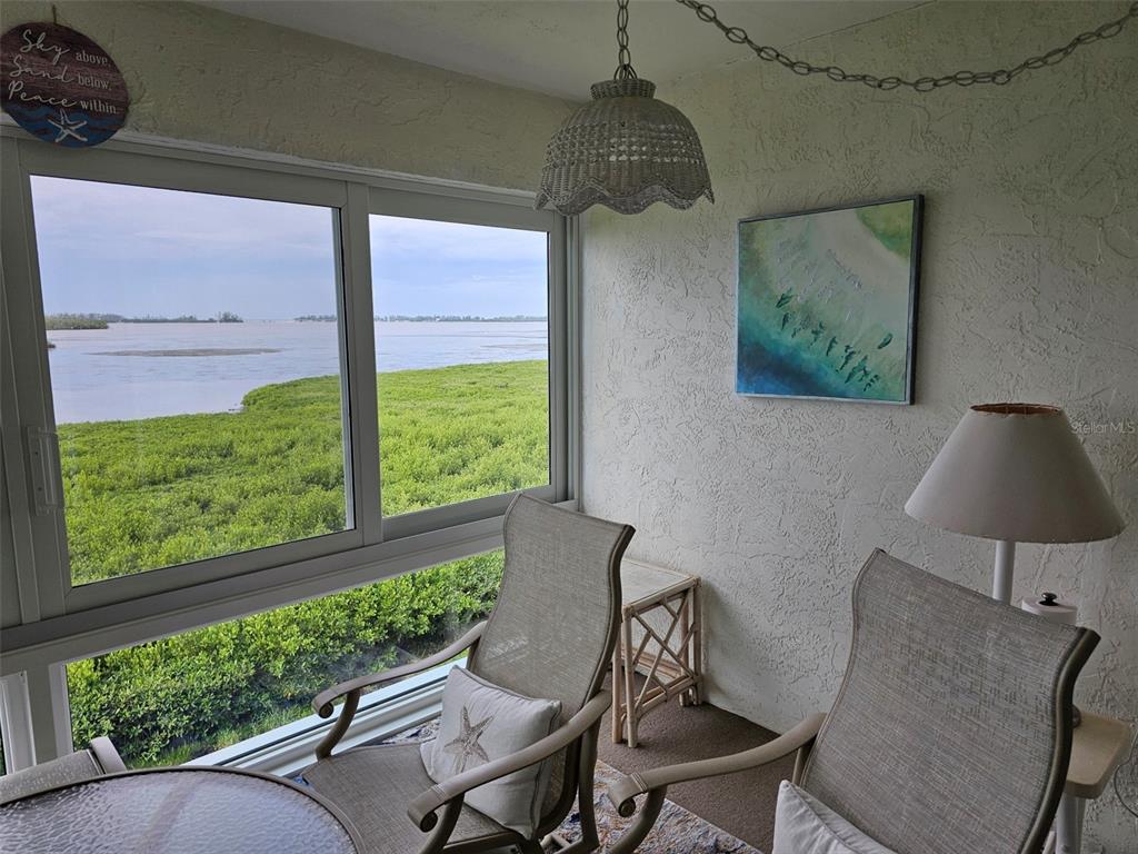 4765 Independence Drive Bradenton, FL 34210 - Photo 26 of 39 a view of a dining room with furniture window and outside view