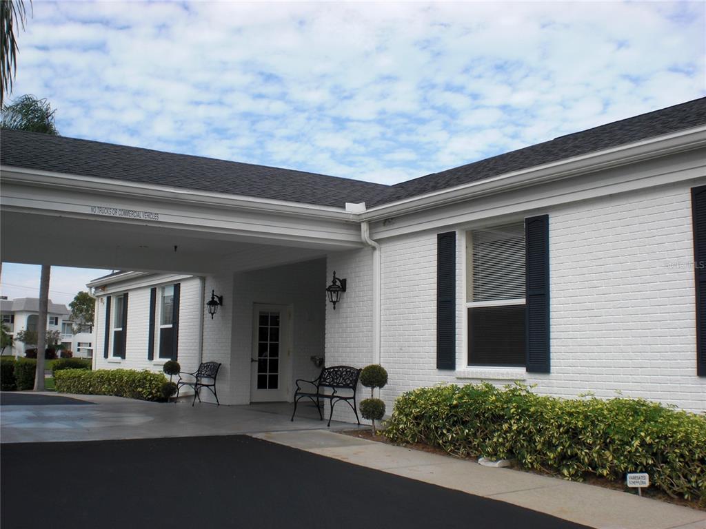 4765 Independence Drive Bradenton, FL 34210 - Photo 31 of 39 a couple of potted plants in front of door
