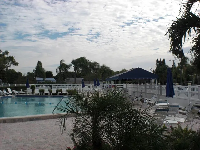 a view of a lake with a garden