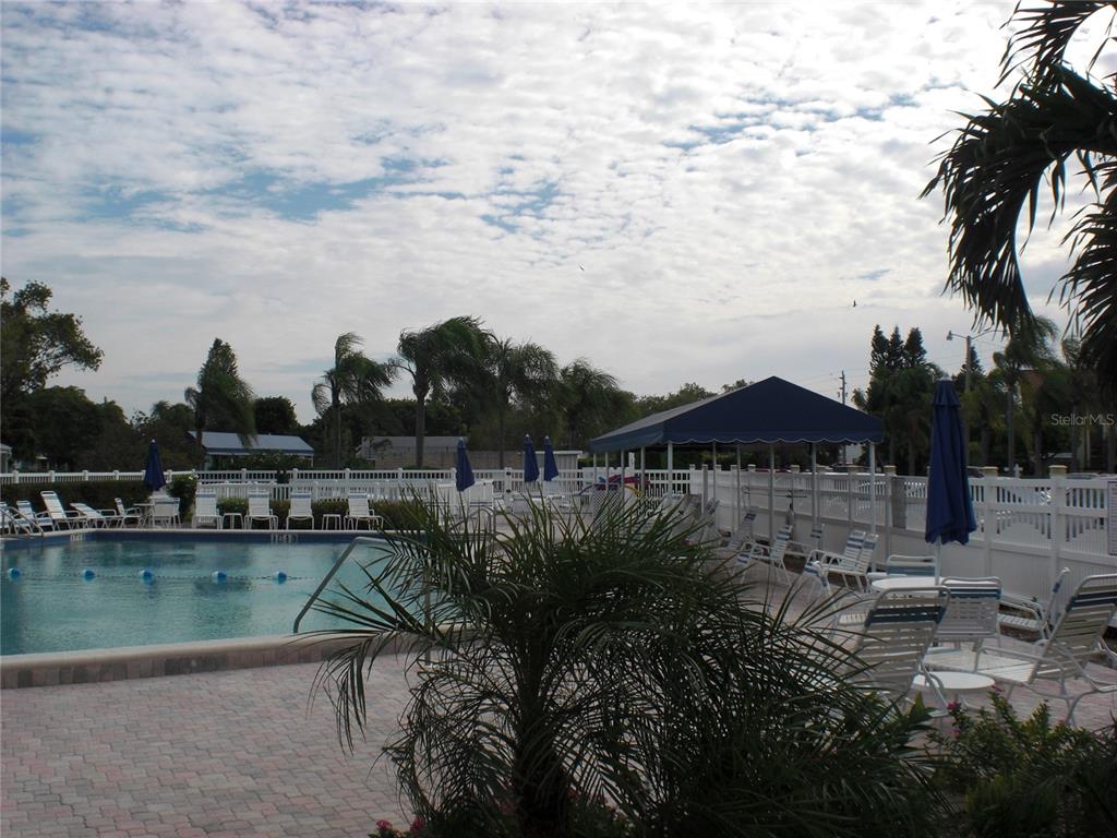 4765 Independence Drive Bradenton, FL 34210 - Photo 34 of 39 a view of a lake with a garden