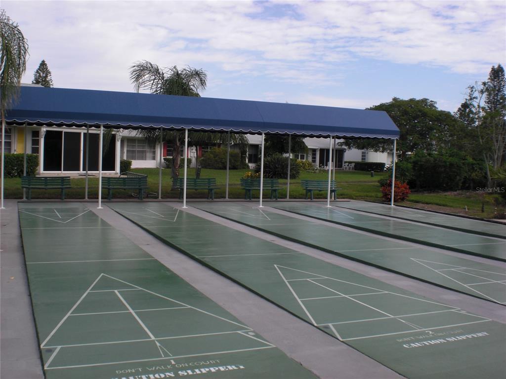 4765 Independence Drive Bradenton, FL 34210 - Photo 35 of 39 a view of a house with a backyard and porch
