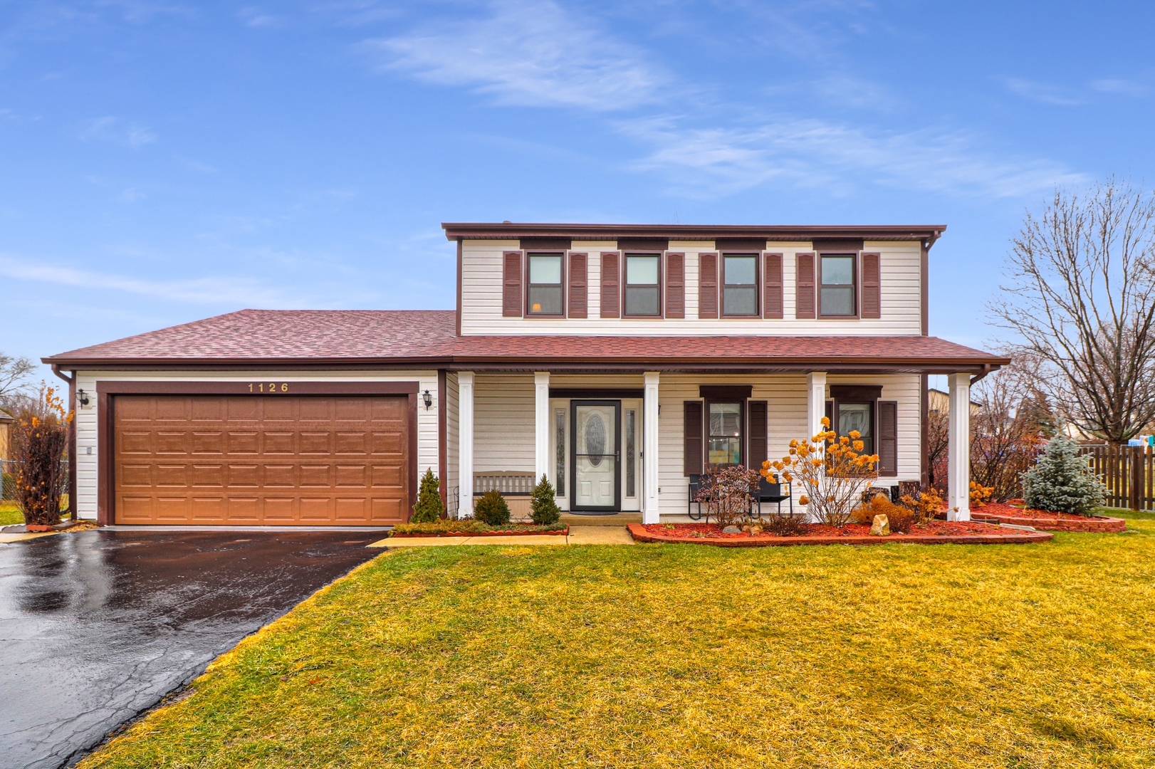 1126 Manchester Road Schaumburg, IL 60193 - Photo 1 of 28 a front view of a house with a yard