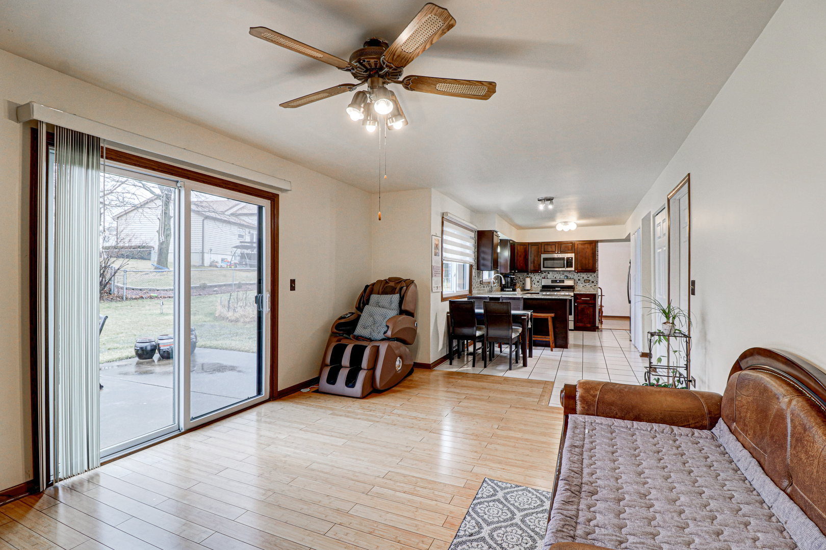 1126 Manchester Road Schaumburg, IL 60193 - Photo 13 of 28 a view of a livingroom with furniture and a window
