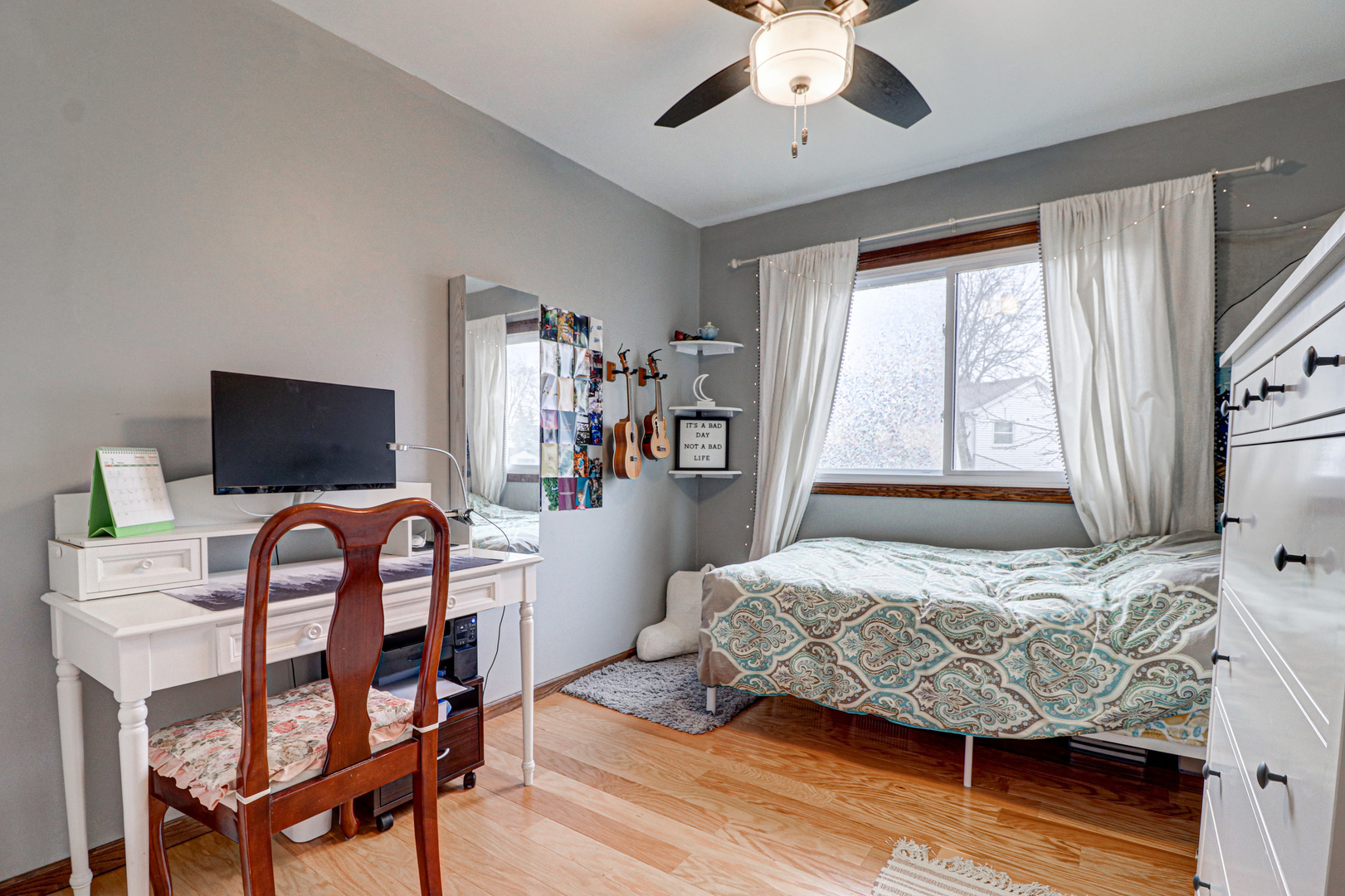 1126 Manchester Road Schaumburg, IL 60193 - Photo 16 of 28 a bedroom with a bed and a flat screen tv