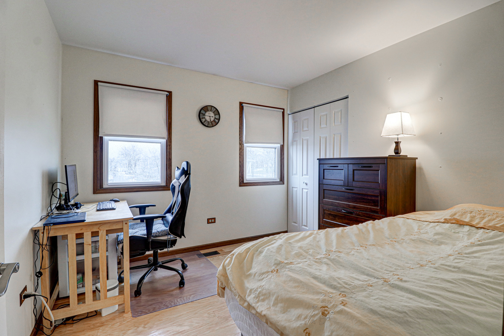 1126 Manchester Road Schaumburg, IL 60193 - Photo 17 of 28 a bedroom with a bed and wooden floor