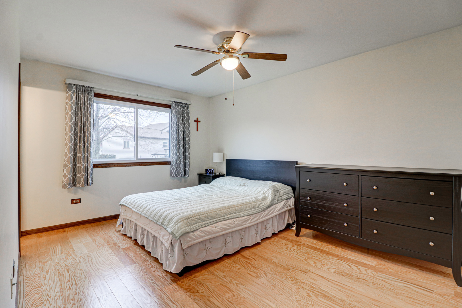 1126 Manchester Road Schaumburg, IL 60193 - Photo 19 of 28 a bedroom with a bed and window