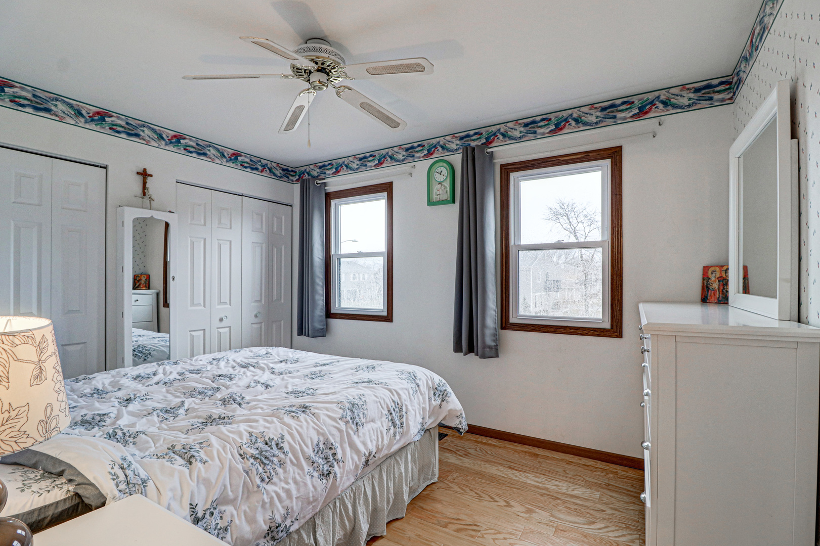 1126 Manchester Road Schaumburg, IL 60193 - Photo 23 of 28 a bedroom with a bed and a chandelier