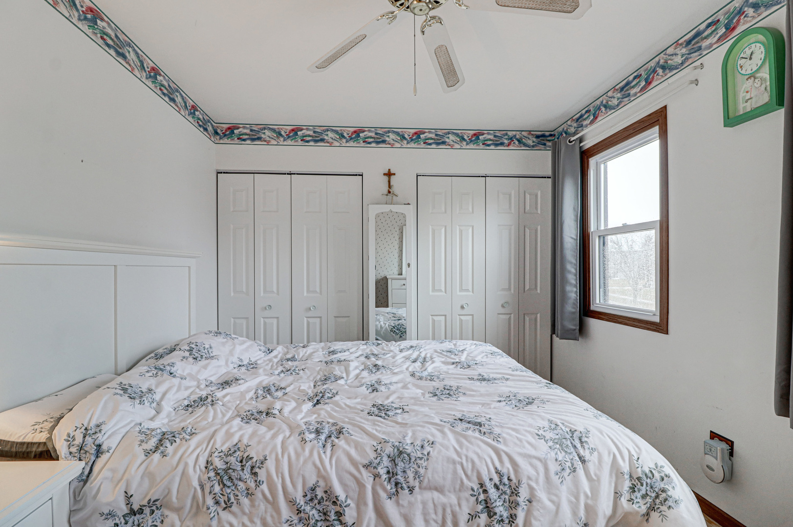 1126 Manchester Road Schaumburg, IL 60193 - Photo 24 of 28 a bedroom with a bed and a window