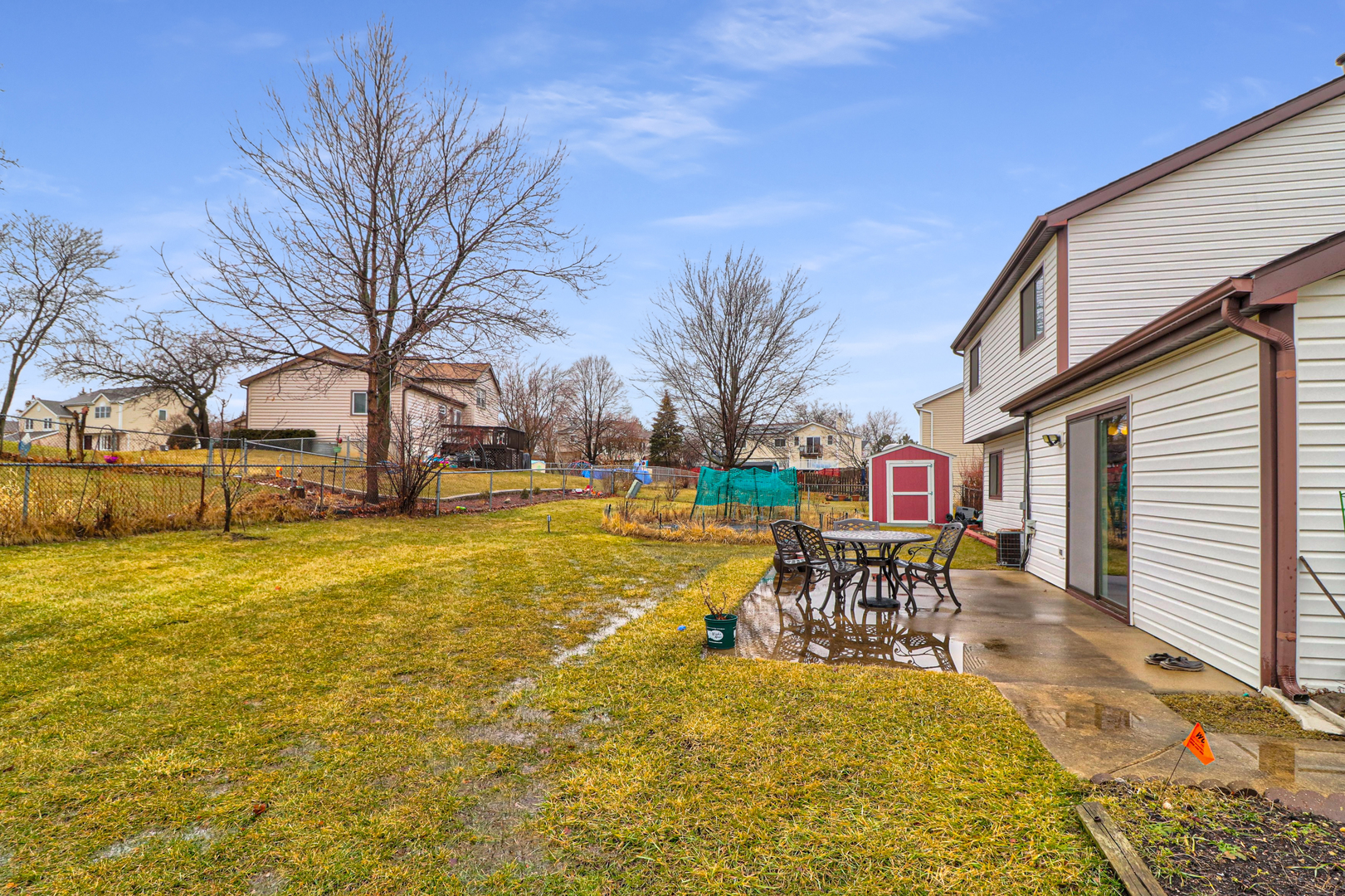 1126 Manchester Road Schaumburg, IL 60193 - Photo 26 of 28 a view of a swimming pool with table and chairs
