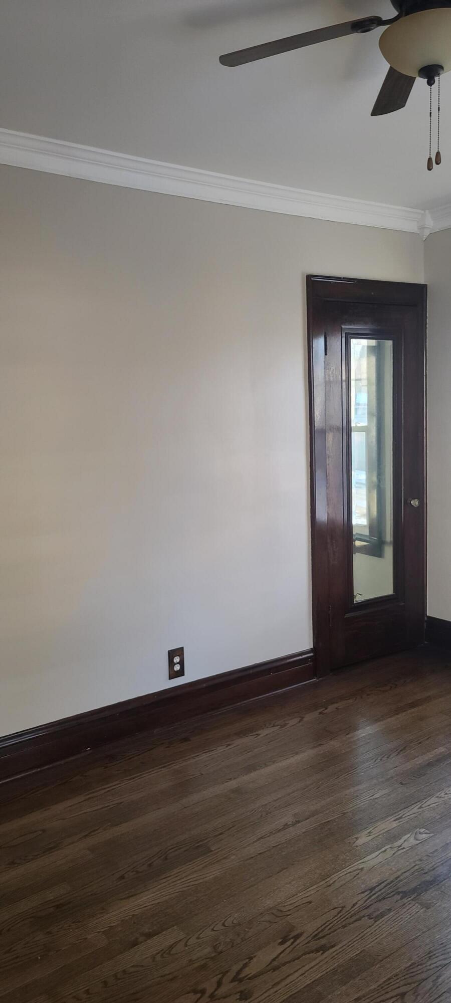 669 South 2nd Street Chesterton, IN 46304 - Photo 12 of 42 a view of an empty room with wooden floor and a window