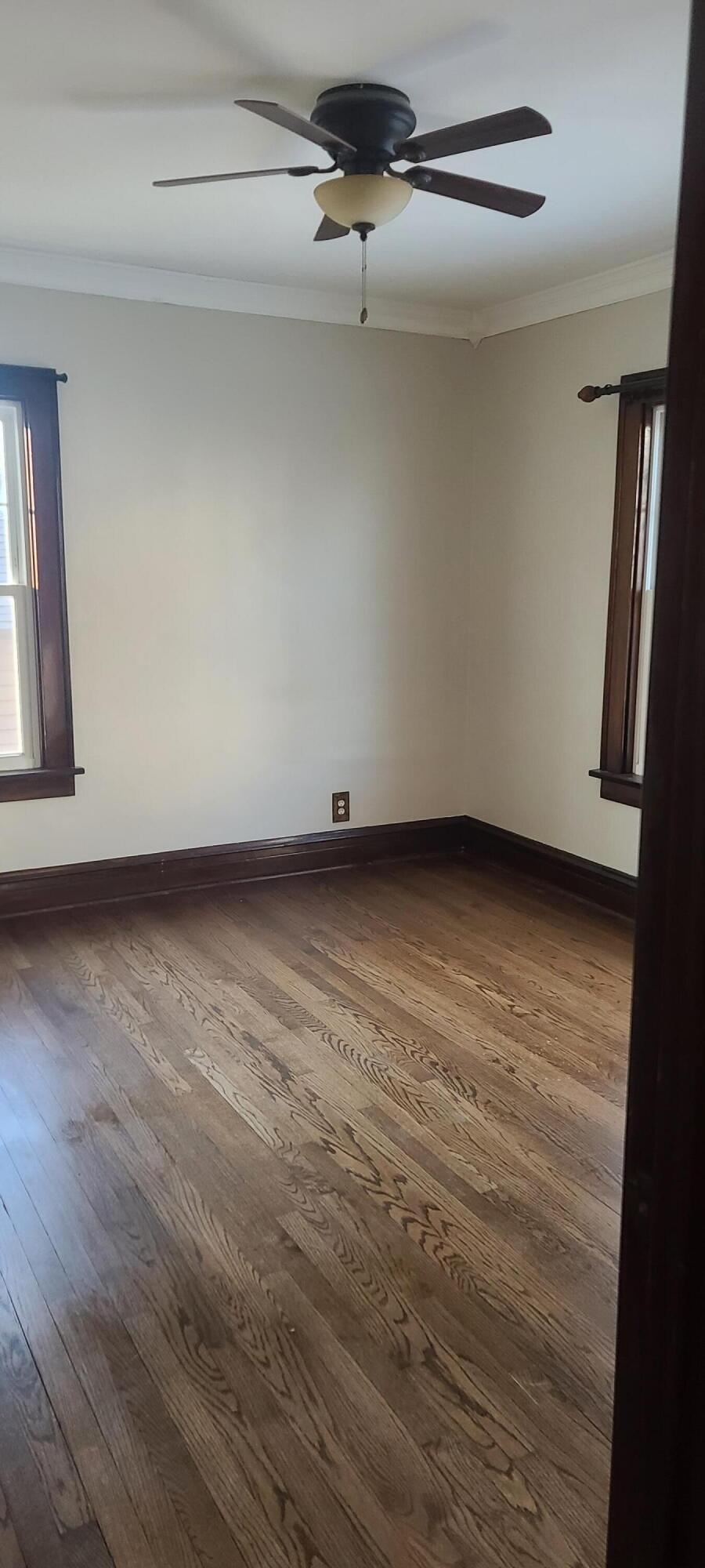 669 South 2nd Street Chesterton, IN 46304 - Photo 14 of 42 a view of an empty room with wooden floor and a window