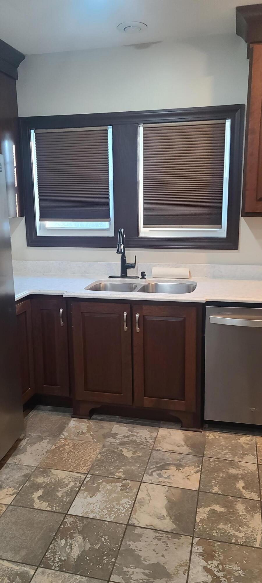 669 South 2nd Street Chesterton, IN 46304 - Photo 21 of 42 a bathroom with a sink and a mirror