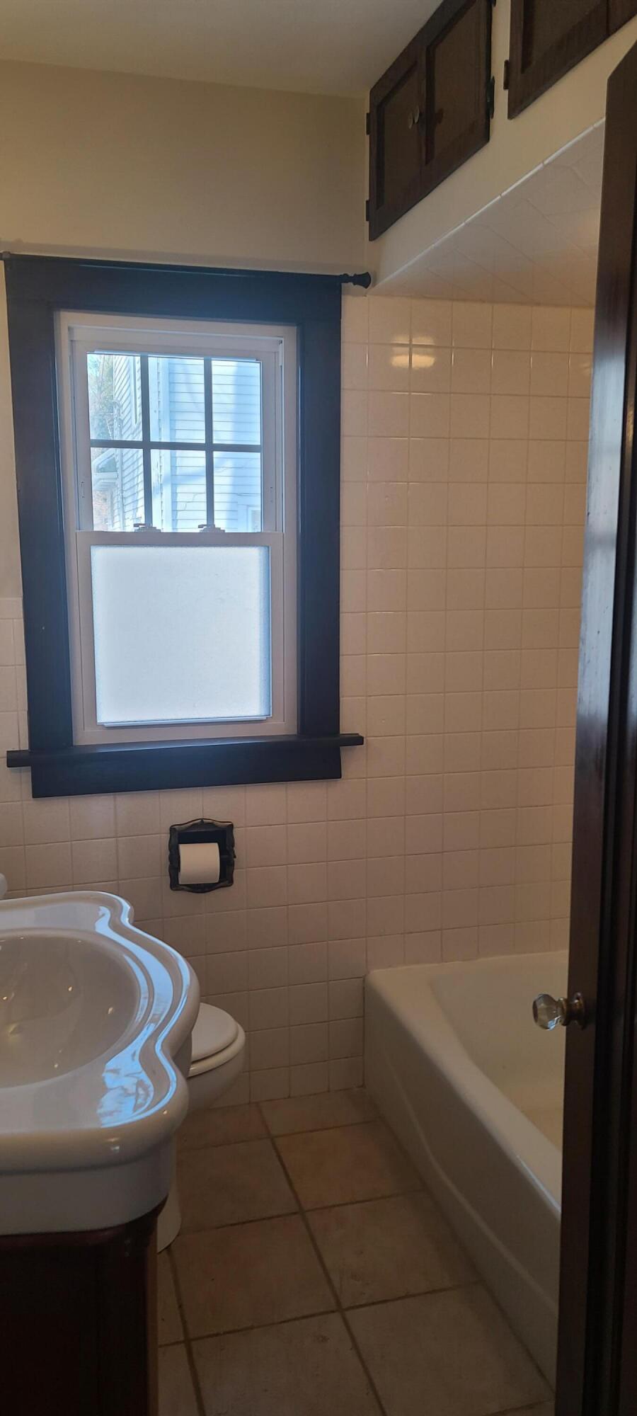 669 South 2nd Street Chesterton, IN 46304 - Photo 29 of 42 a bathroom with a sink and a bathtub