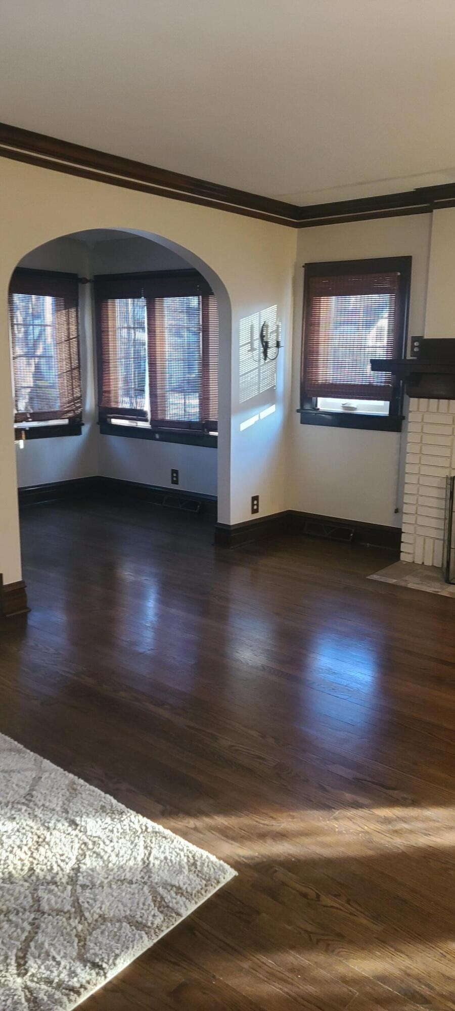 669 South 2nd Street Chesterton, IN 46304 - Photo 6 of 42 a view of an empty room with wooden floor and a window