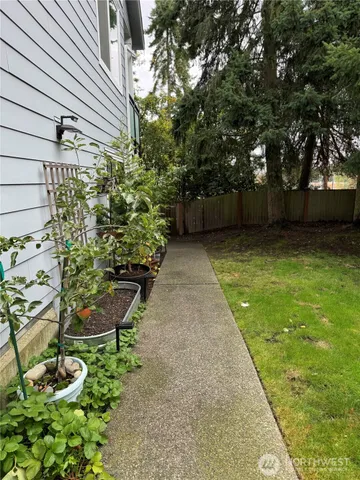 a backyard of a house with lots of green space