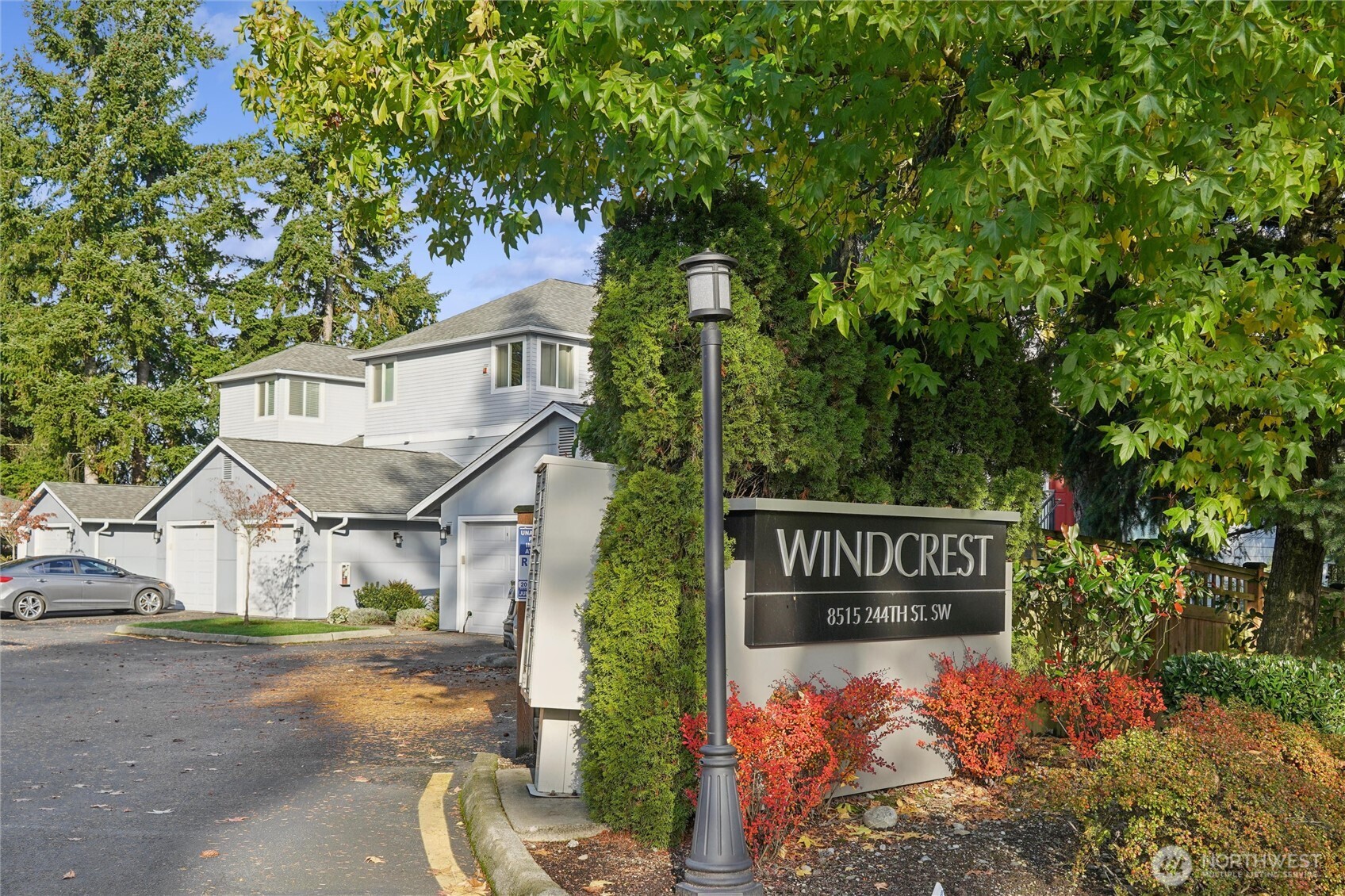 8515 244th Street Southwest, Unit A5 Edmonds, WA 98026 - Photo 2 of 20 a view of a street sign of a house