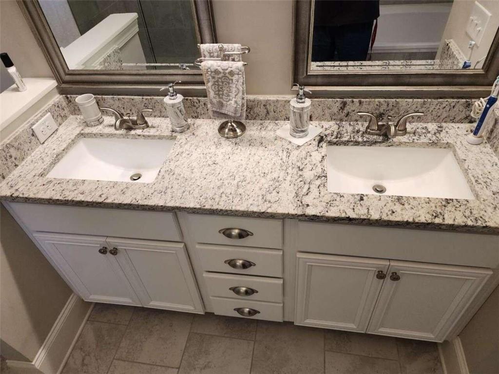 194 Yorkshire Lane Villa Rica, GA 30180 - Photo 11 of 20 a bathroom with a sink and a mirror