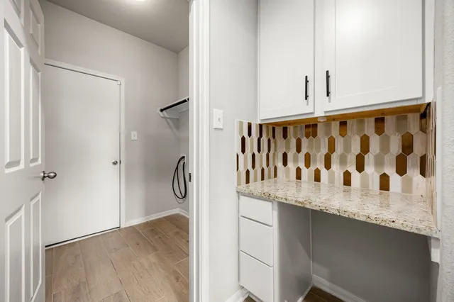 a white bath tub sitting in a bathroom