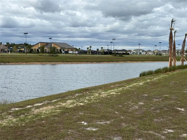 a view of an ocean and city