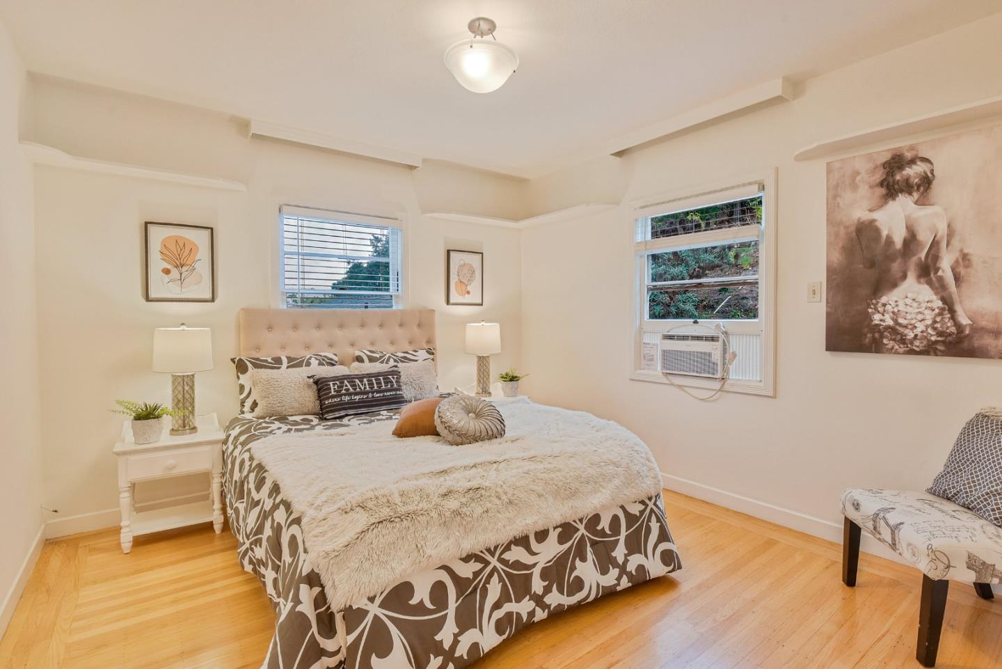 14 Belle Avenue San Rafael, CA 94901 - Photo 12 of 40 a bedroom with a bed and wooden floor