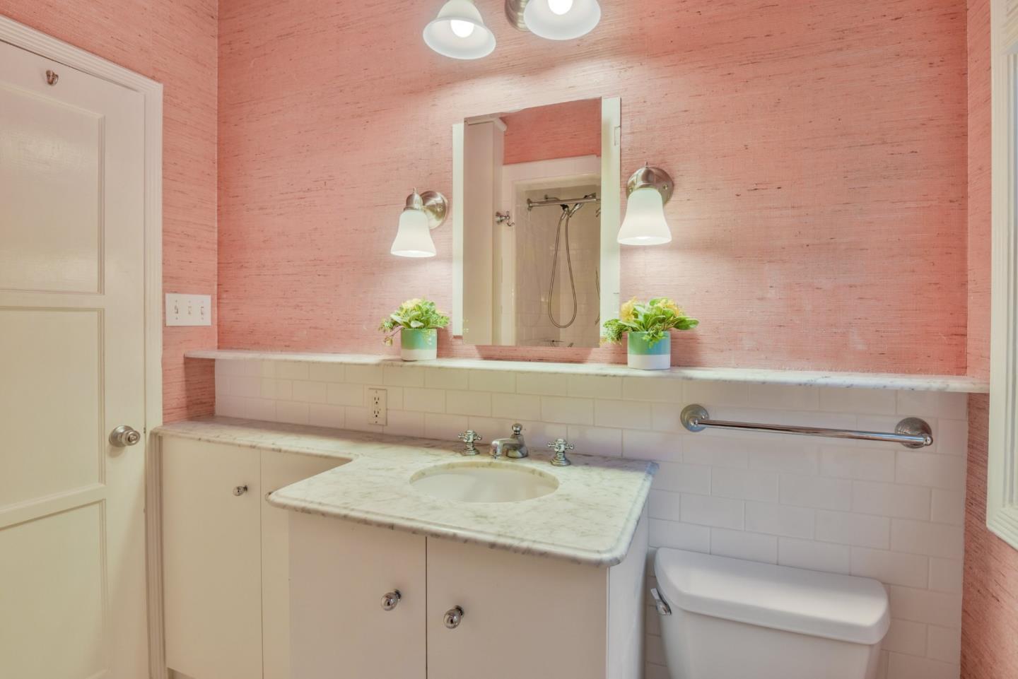 14 Belle Avenue San Rafael, CA 94901 - Photo 18 of 40 a bathroom with a granite countertop toilet sink and mirror