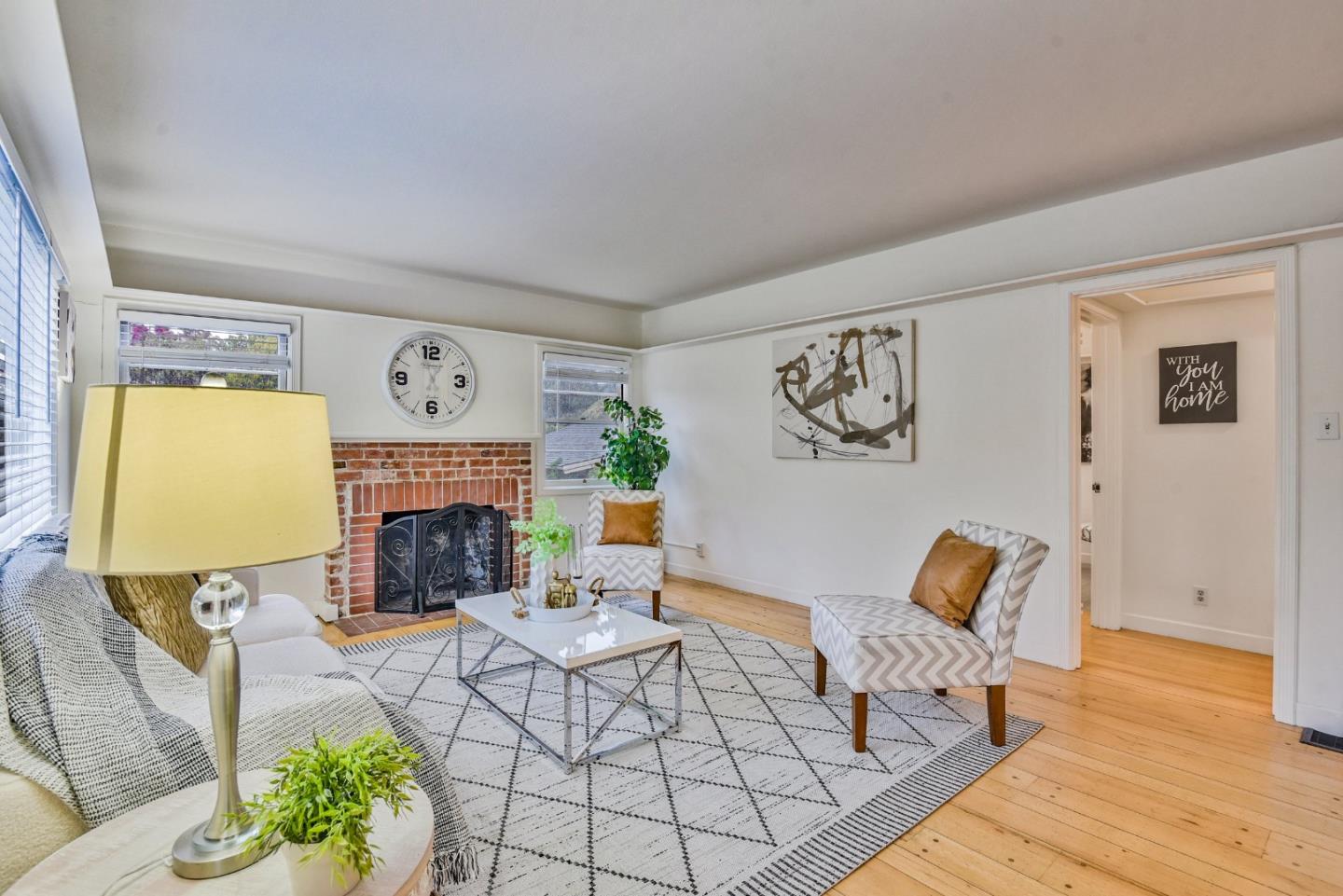14 Belle Avenue San Rafael, CA 94901 - Photo 2 of 40 a living room with furniture and a fireplace