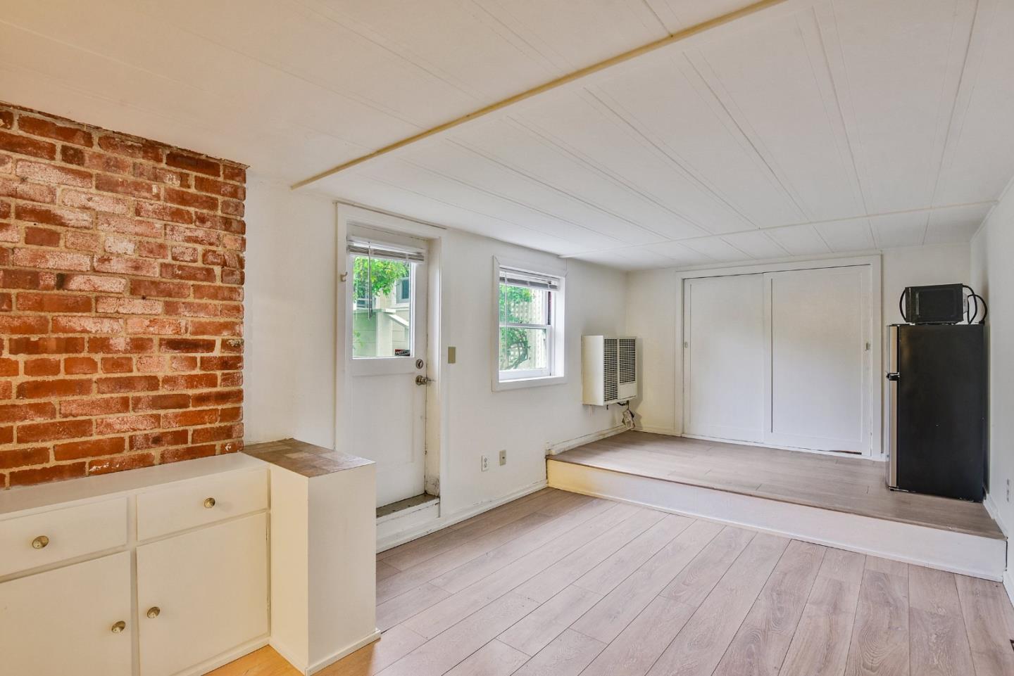 14 Belle Avenue San Rafael, CA 94901 - Photo 21 of 40 a view of empty room with wooden floor and cabinet