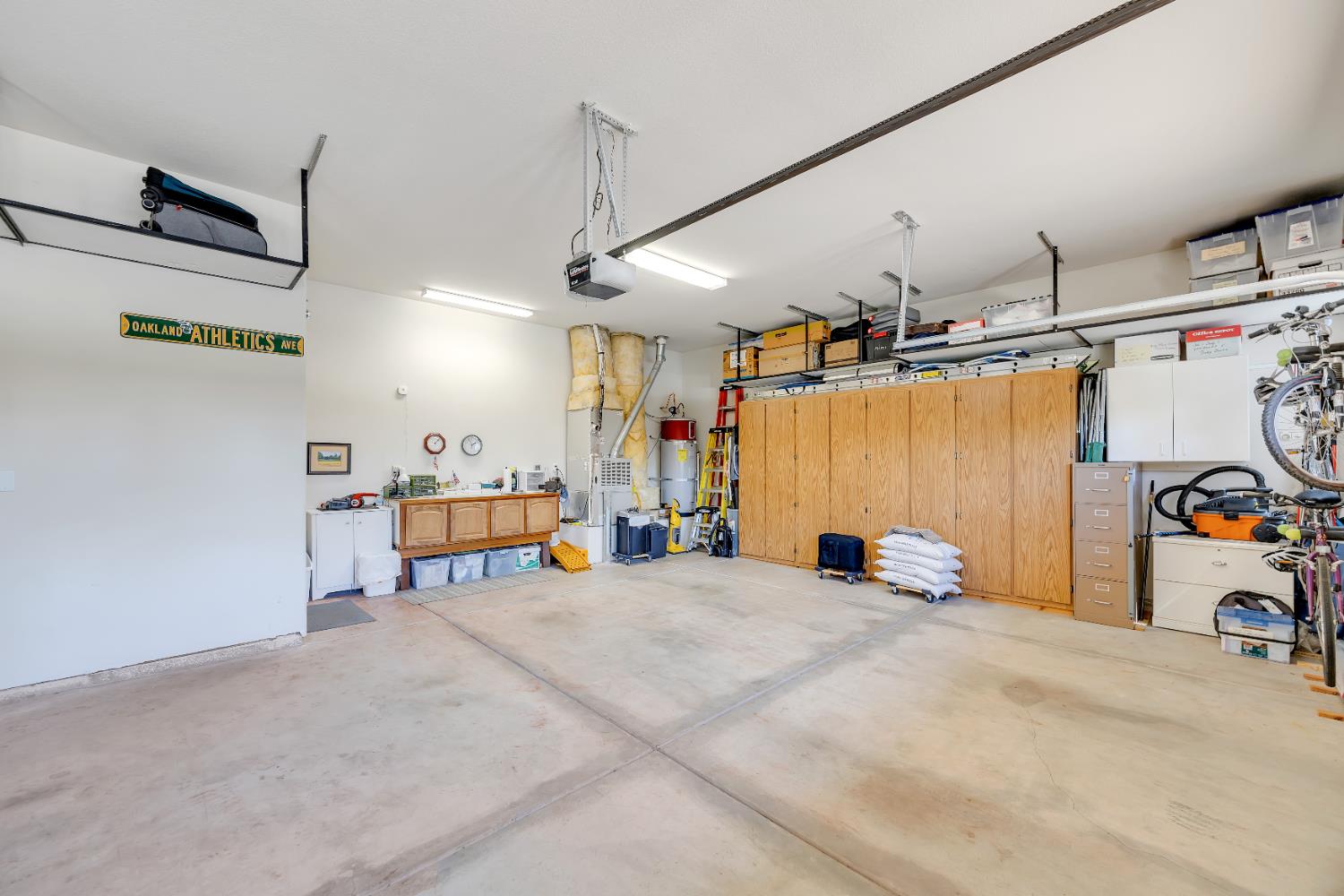 16 Rock Ridge Court, Unit 289 Copperopolis, CA 95228 - Photo 65 of 78 Large 3 car garage. Cabinets, workbench, Insulated Garage Doors. New rollers on the main door.