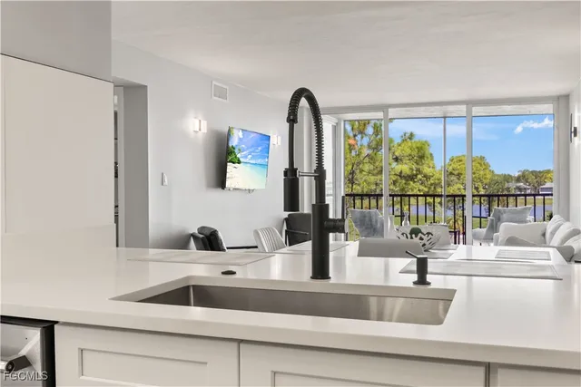 a view with a sink and a mirror