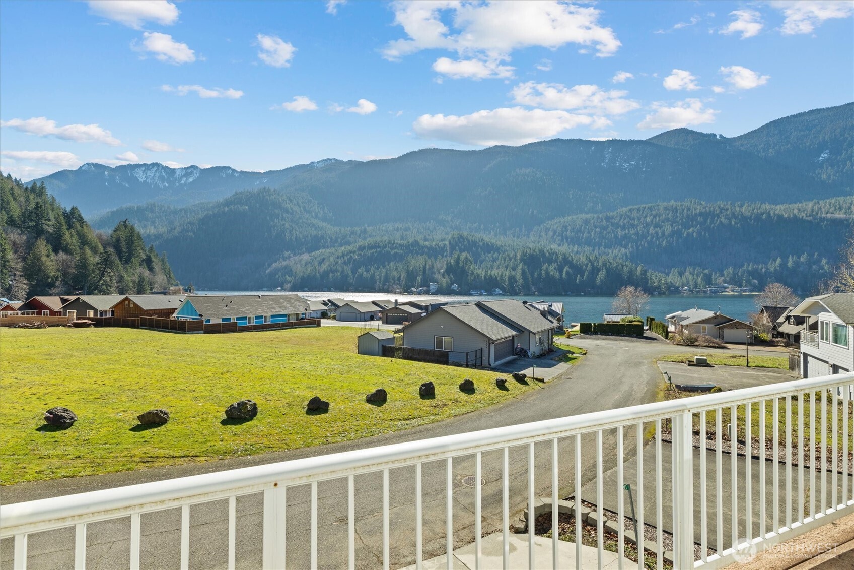 481 Maple Grove Road Port Angeles, WA 98363 - Photo 4 of 40 a view of a balcony with mountain view