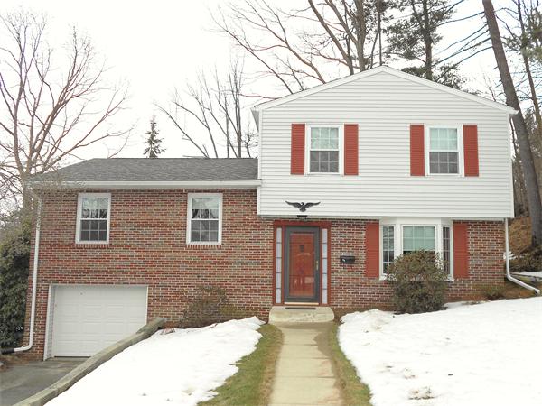 48 Meadowview Road Holyoke, MA 01040 - Photo 1 of 9 a front view of a house with a yard