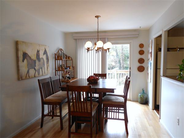48 Meadowview Road Holyoke, MA 01040 - Photo 4 of 9 a view of a dining room with furniture window and wooden floor